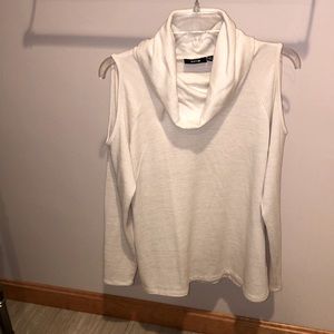 Women’s Beige Sweater with cutout sleeves.